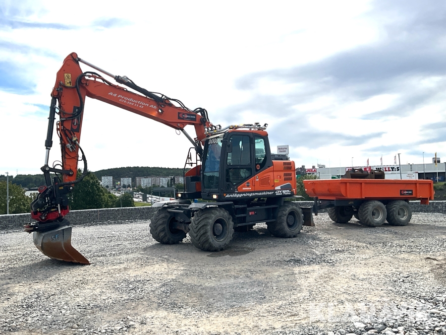 Hjulgrävare Doosan DX165W-5 med grävsystem, rototilt och entreprenadvagn