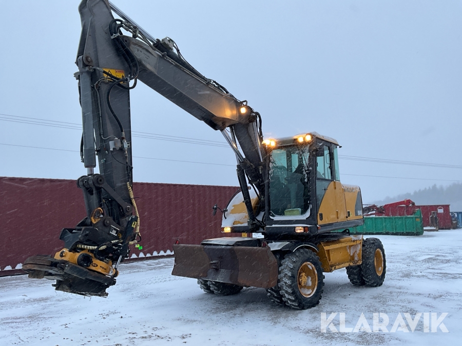 Grävmaskin Volvo EW140 med tiltrotator