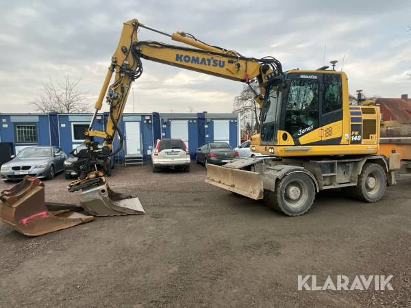 Grävmaskin Komatsu PW148 med skopor och grävsystem