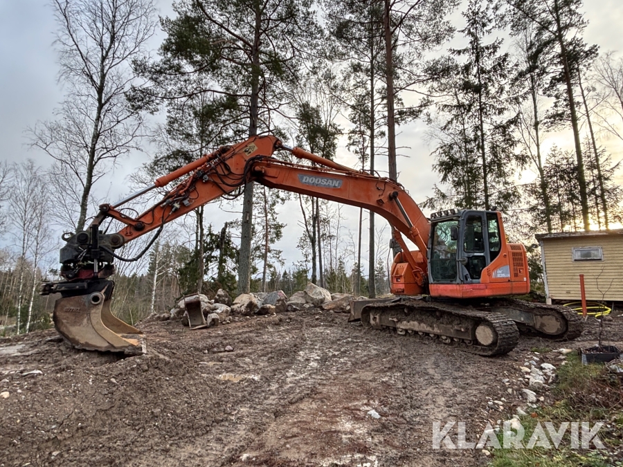 Grävmaskin Doosan DX 235LCR med  moba grävsystem, rototilt och redskap
