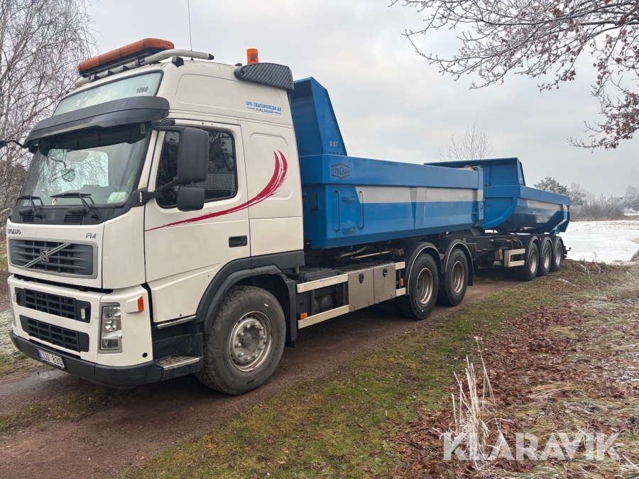 Schaktbil Volvo FM13 med trippelkärra