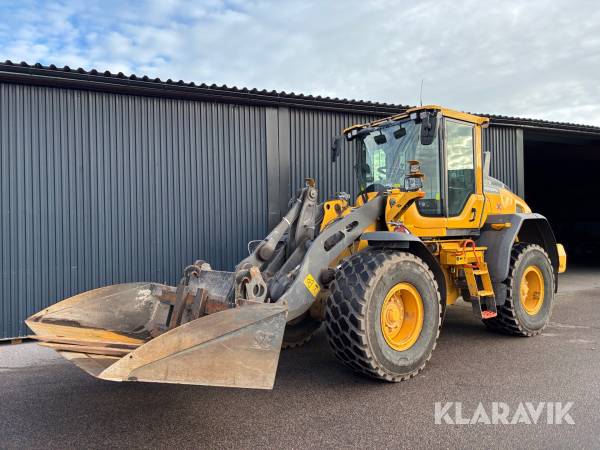 Hjullastare Volvo L60H med Planeringsskopa och pallgafflar