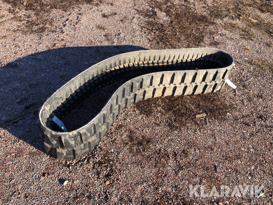 Larvband till grävmaskin