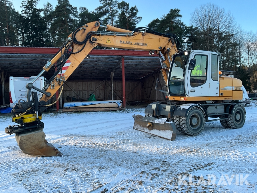 Grävmaskin Liebherr A316 Litronic med vagn och redskap