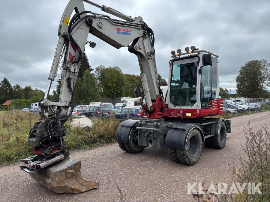 Grävmaskin Takeuchi Take-job TB295w med tiltrotator och skopa