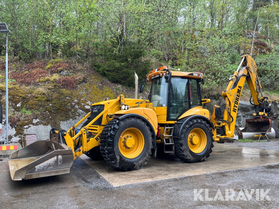 Grävlastare Hydrema 926E med flera redskap