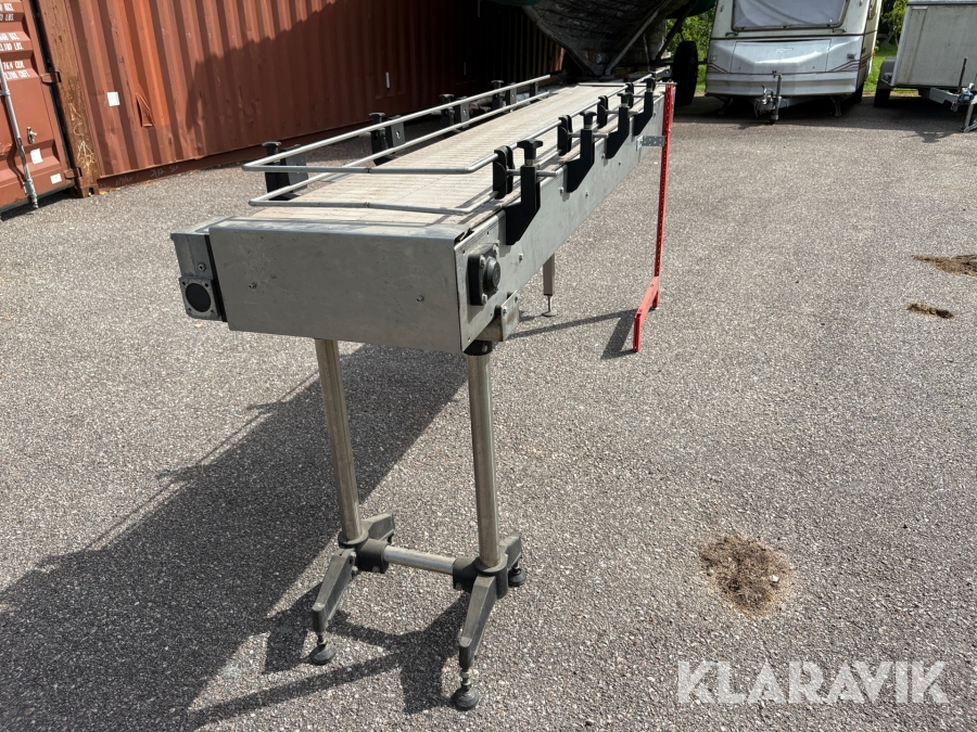 Slutstation, transportband