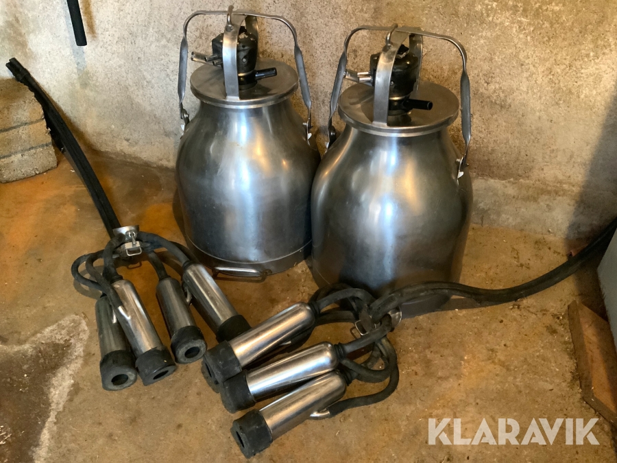 Mjölkkannor med spenkoppar