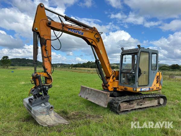 Grävmaskin Hanix H75B med planeringsskopa