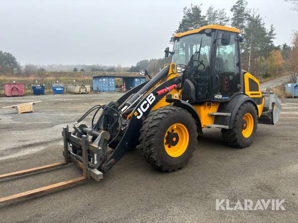 Hjullastare JCB 409 T4 med 6 redskap