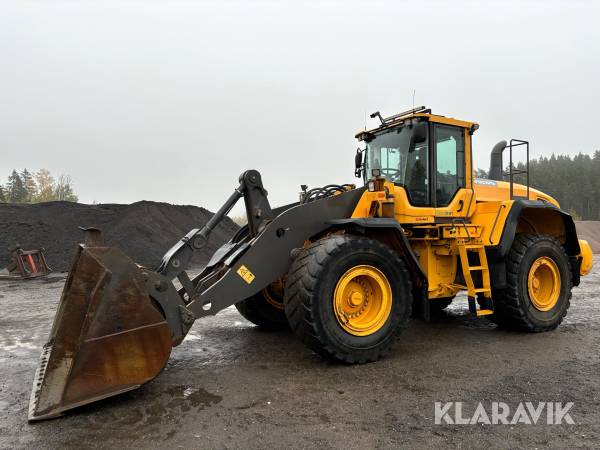 Hjullastare Volvo L180G med lång bom och grusskopa