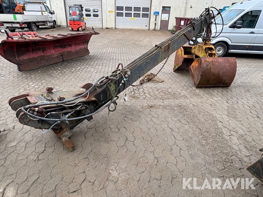 Kranarm med skopa