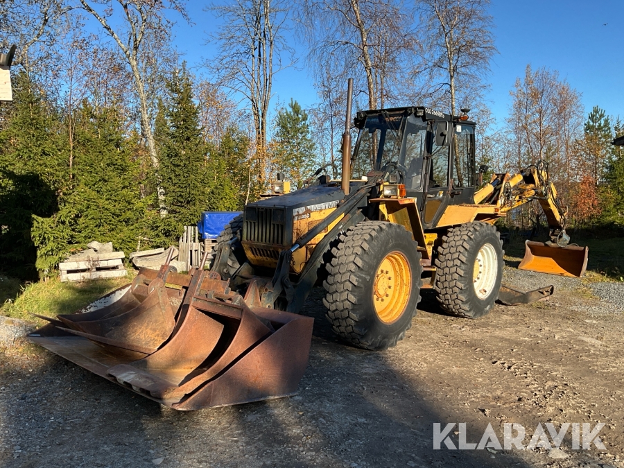 Grävlastare Lundberg Hymas TM9 med flera redskap