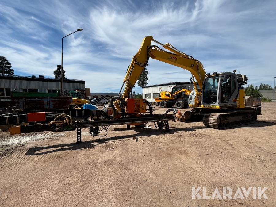 Grävmaskin New Holland E135BSR-2 med borrutrustning