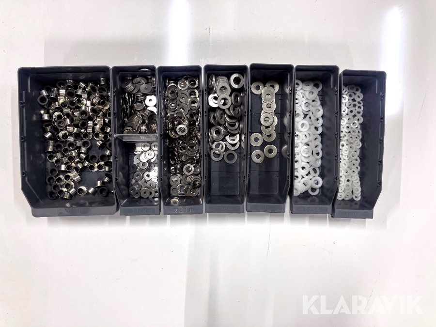 Parti med glidlager och brickor i stål/plast