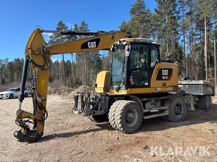 Grävmaskin CAT M317F med redskap