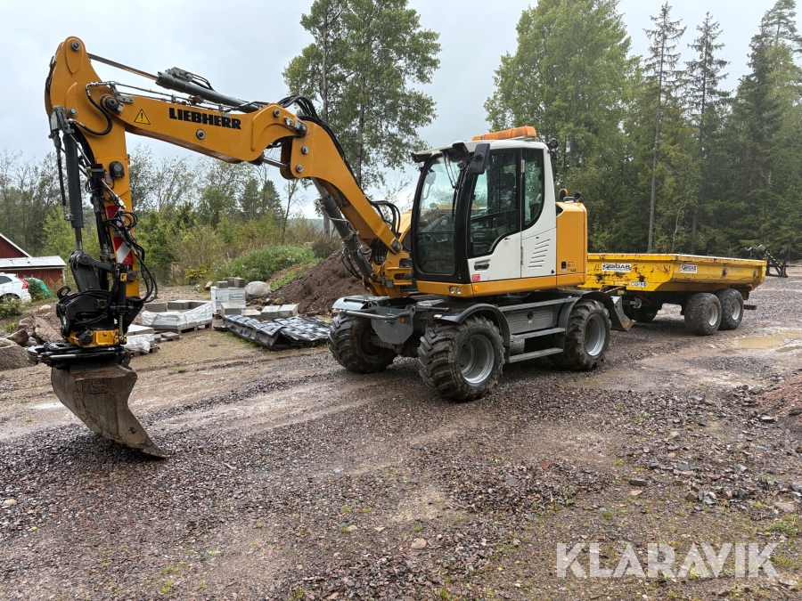 Hjulgrävare Liebherr A 910 Compact med vagn och redskap