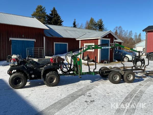 Fyrhjuling Yamaha Grizzly 600 med skogsvagn och kran