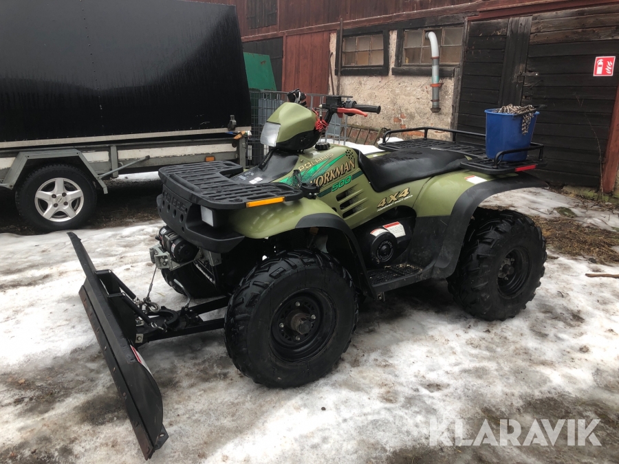 Fyrhjuling Polaris Workman 500 cc med snöblad och kedjor