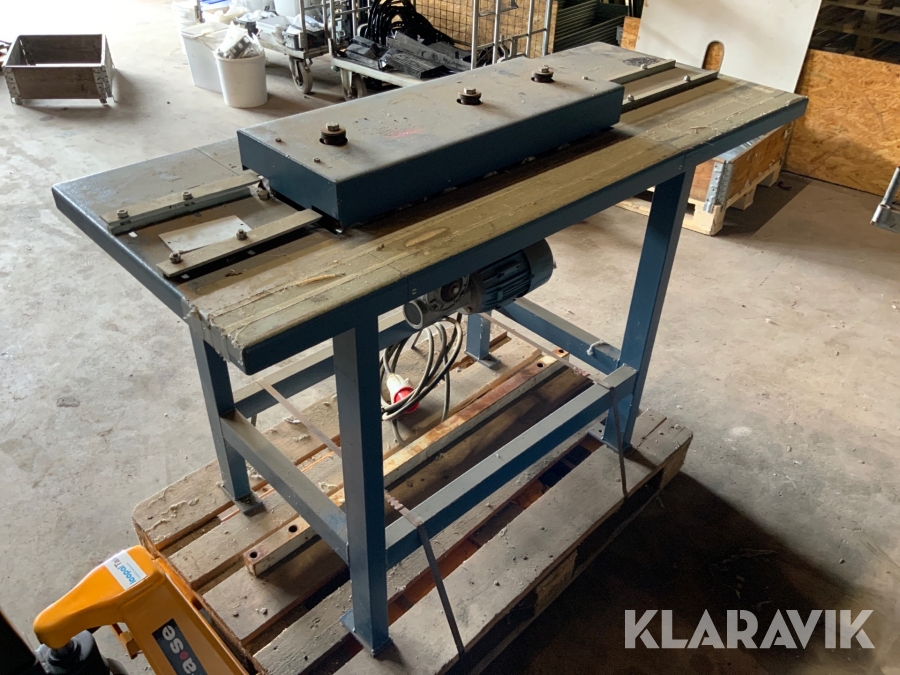 Falsmaskin för bandtäckning