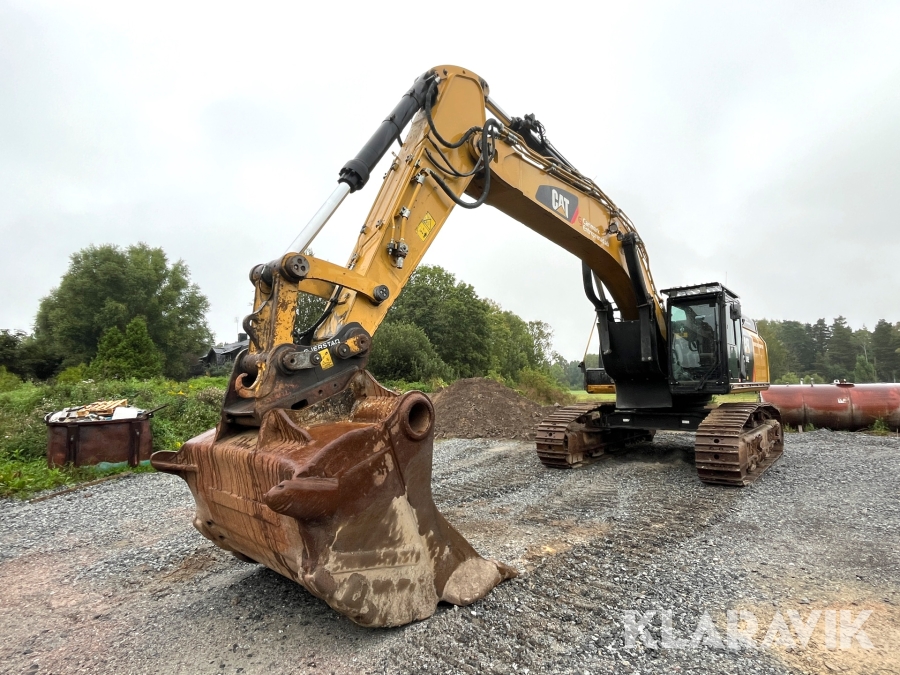 Grävmaskin CAT 349E med redskap