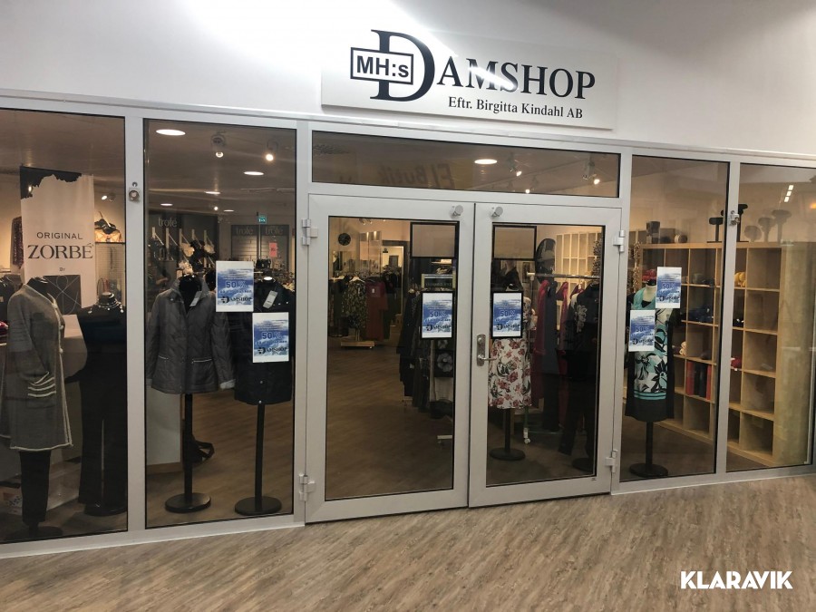 Damklädesbutik indredning och butiksvaror 