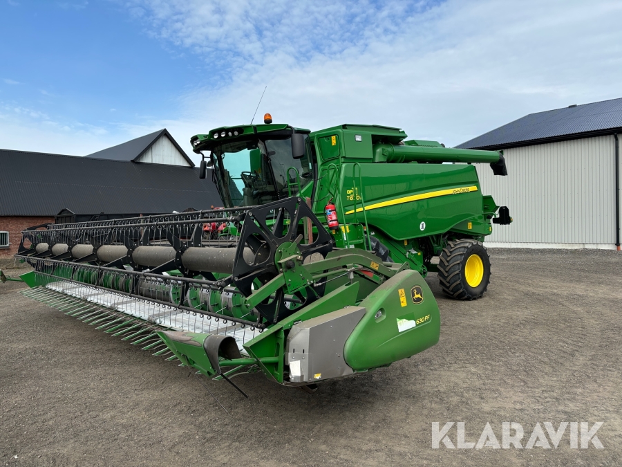 Skördetröska John Deere T670i med 630 PF skärbord och vagn