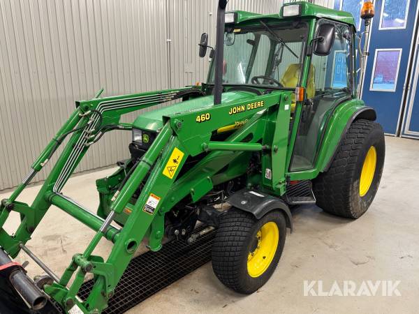 Traktor John Deere 4710 frontlastare och redskap