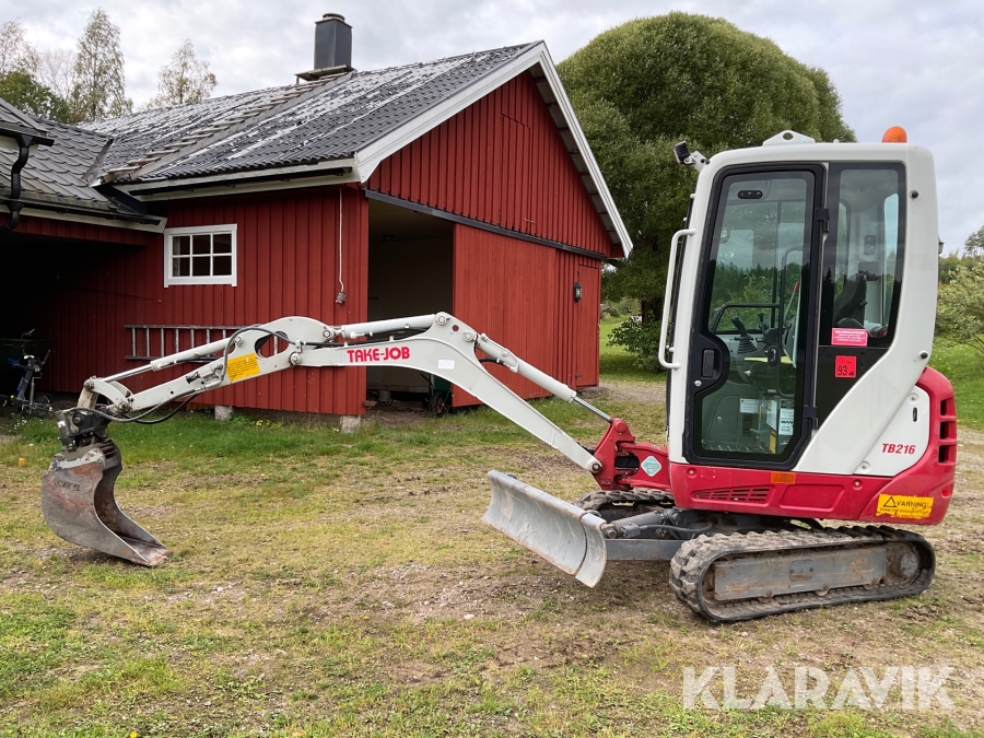 Grävmaskin Takeuchi TB216 med redskap och trailer