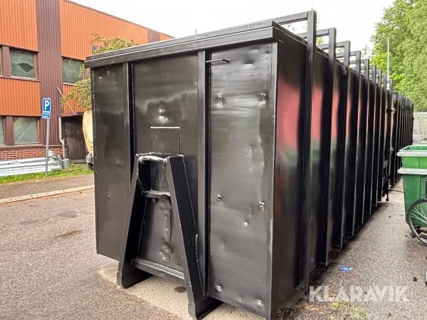 Lastväxlarcontainer komprimator