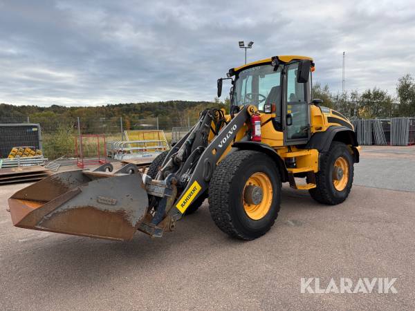 Hjullastare Volvo L45F med skopa och pallgafflar