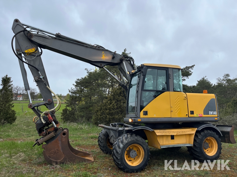 Grävmaskin Volvo EW140 med skopor
