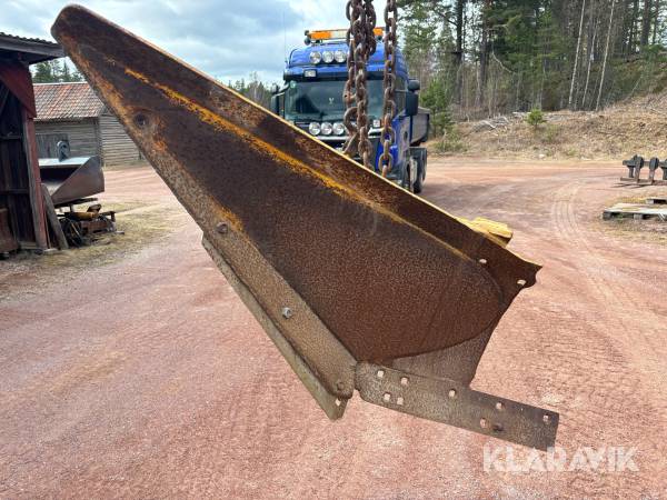 Dikningsvinge för väghyvel