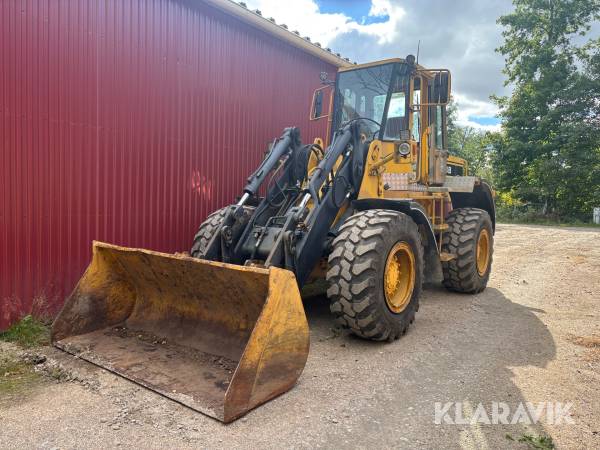 Hjullastare CAT IT28B med snöblad