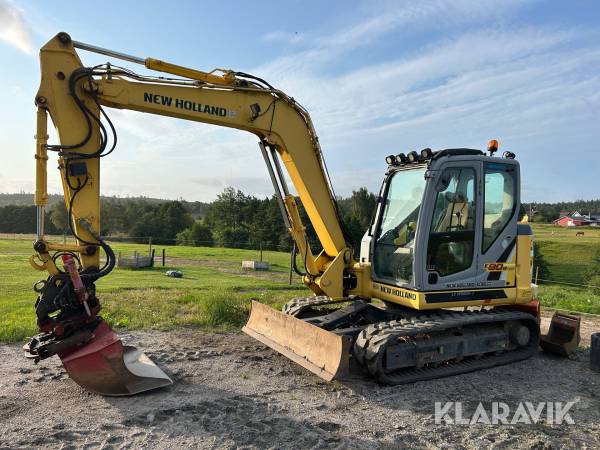 Grävmaskin New Holland E80BMSR-2 med rotator med grip & 4 redskap