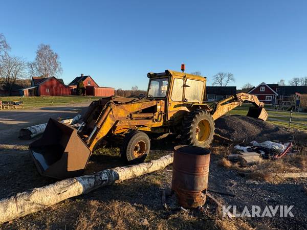 Traktorgrävare Hymas med skopor