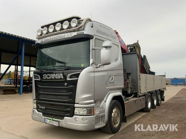 Kranbil Scania G410 med korg och grip