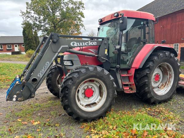 Traktor McCormick Mc100 med lastare och redskap