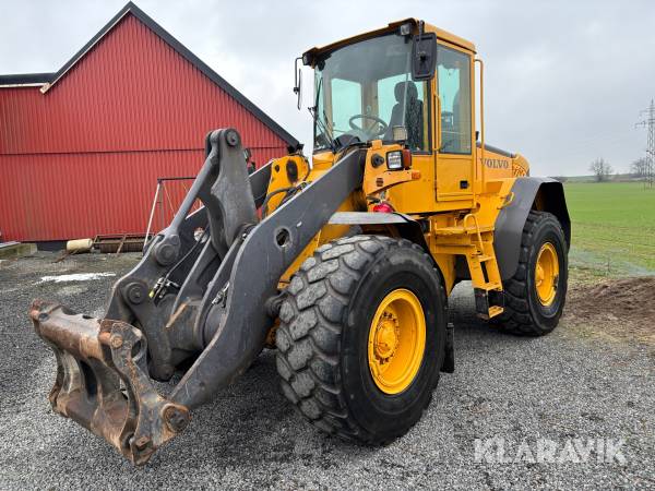 Hjullastare Volvo L70E med skopa och gafflar