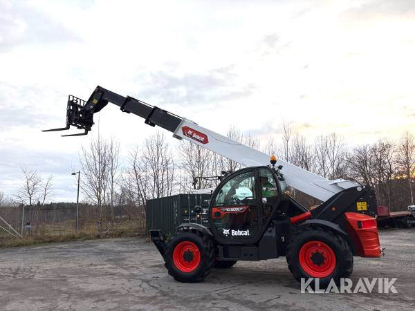 Teleskoplastare Bobcat T40.180 SLPRC med skopa och gafflar