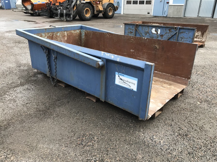 Materialbask, självtömmande