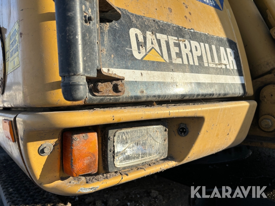 Hjulgrävare CAT M313C med tiltrotator och skopa