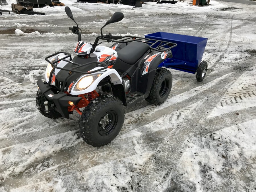 Ny Fyrhjuling med Sandspridare