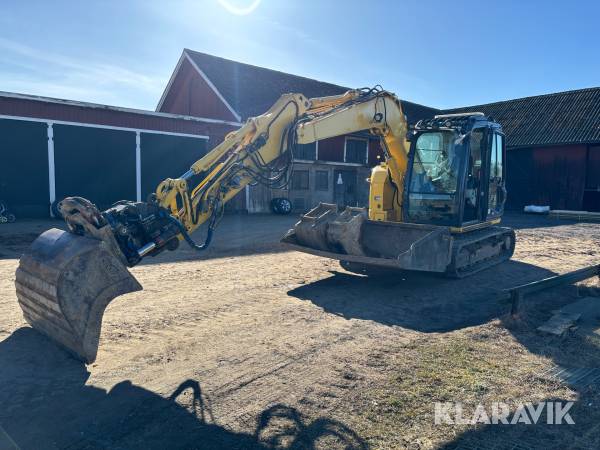 Grävmaskin New Holland E75CSR med redskap